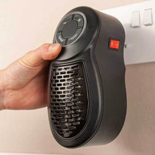 Load image into Gallery viewer, Plug-in Go Heater, warming up to 250 sq. ft. cost-efficient, with adjustable temperature settings (15°C - 32°C) and overheat protection, lightweight and portable, comes with a handy remote. Home Appliances. Fan Heaters,Gift